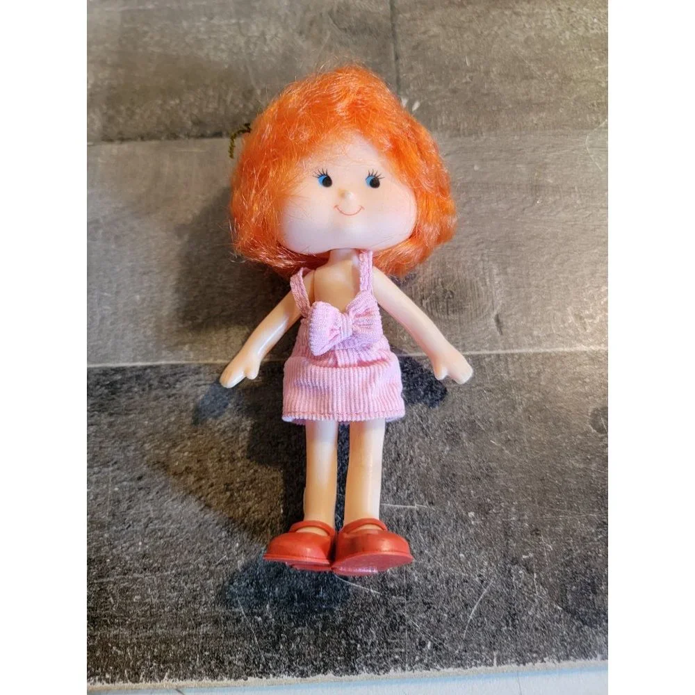 Orange hair girl pink overall doll toy‎ figure